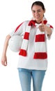 Football fan in white wearing scarf holding ball Royalty Free Stock Photo