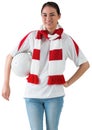 Football fan in white wearing scarf holding ball Royalty Free Stock Photo