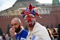 Football fans pose for photos on the Red Square in Moscow