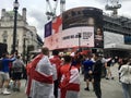 Football fans of England with the national flag glorify their team in the World Cup before the match