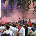 Football fans of England with the national flag glorify their team in the World Cup before the match