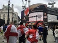 Football fans of England with the national flag glorify their team in the World Cup before the match
