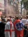 Football fans of England with the national flag glorify their team in the World Cup before the match