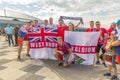 Football fans of England with the national flag glorify their team in the World Cup before the match England Sweden