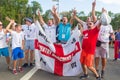 Football fans of England with the national flag glorify their team in the World Cup before the match England Sweden