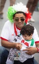 Football fans of Iran at 2018 FIFA world cup in Russia. A man and a boy
