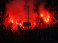 Football fans light flares