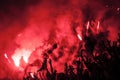 Football fans lit up the lights, flares and smoke bombs. Protest concept