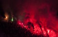 Football fans lit up the lights, flares and smoke bombs. Protest concept