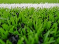 Football field, astro turf surface. Close up of throw in, kick off and corner area. Lushed green football pitch Royalty Free Stock Photo