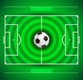 Football field with circular grass texture and soccer ball Royalty Free Stock Photo