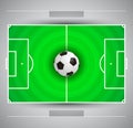 Football field with circular grass texture and soccer ball Royalty Free Stock Photo