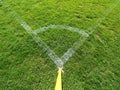 Football field corner detail with white marks and flag stick Royalty Free Stock Photo