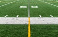 Football field at fifty 50 yard line Royalty Free Stock Photo