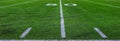 Football Field Green Yard Markers to Goal Line Touchdown Endzone Game Competition Royalty Free Stock Photo