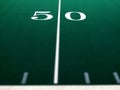 Football Field for Sports and Achievement 50 Yard Mark selective focus blur Royalty Free Stock Photo