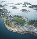 Football field stadium in Henningsvaer from above. Henningsvaer is a fishing village near Reine and Hamboy located on Royalty Free Stock Photo