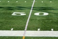 Football fifty yard marker Royalty Free Stock Photo