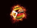 Football in flames with flag of zimbabwe Royalty Free Stock Photo