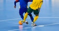 Football Futsal Ball and man Team. Indoor Soccer Sports Hall. Royalty Free Stock Photo