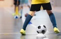 Football futsal player, ball, futsal floor. Sports background. Royalty Free Stock Photo