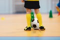Indoor european football background. Close-up of futsal player. Football futsal training for children Royalty Free Stock Photo