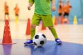 Football futsal training for children. Soccer training dribbling