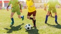 Football Game on Summer Sunny Day. Young Boys Compete in Tournament Match Royalty Free Stock Photo