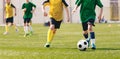 Football Game on Summer Sunny Day. Young Boys Compete in Tournament Match Royalty Free Stock Photo