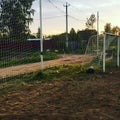 A football gates in the countryside. Sunrise