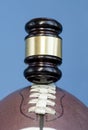 Football with gavel, legal issues Royalty Free Stock Photo