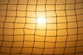 Football goal net at sunset with sun Royalty Free Stock Photo