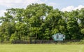 A football goal post and old scoreboard on a field in Swissvale, Pennsylvania, USA