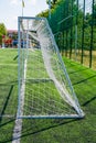 Football goal at the stadium. Metal fence wire in the background Royalty Free Stock Photo