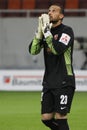 Football goalkeeper praying