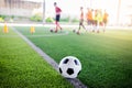 Football on green artificial turf