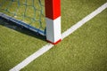 Football or handball goal with red and white goalpost. Sport, recreation and healthy lifestyles on fresh air