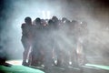 Football Huddle in fog