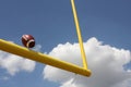 Football kicked through the Goal Posts Royalty Free Stock Photo