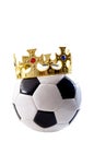 Football is the king of sports, championship winner and league champion concept with a soccer ball wearing a golden crown isolated