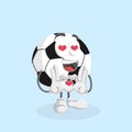 Football Mascot and background in love pose Royalty Free Stock Photo