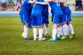 Football match for children. Youth sports team celebrate. Royalty Free Stock Photo