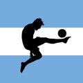 Football player, argentinian flag in background Royalty Free Stock Photo