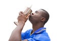 Football player in blue kiss winners cup Royalty Free Stock Photo