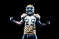 Football player celebrates after scoring a touchdown. Royalty Free Stock Photo