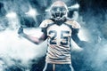 Football player celebrates after scoring a touchdown. Royalty Free Stock Photo