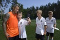 Football player Marlos, Shakhtar soccer team, signing autographs to children