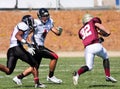 Football Player Running with the Ball During a Game