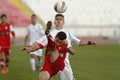 Football players fighting for the ball