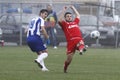 Football players fighting for the ball